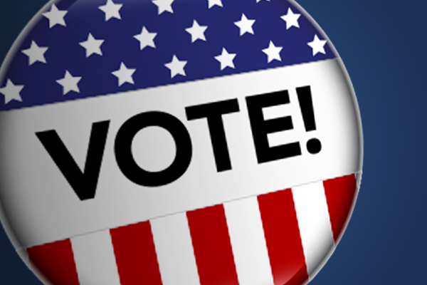 Button with the word 'VOTE!' on it